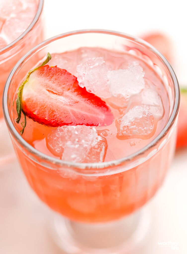 upclose photo of pink cranberry mocktail in a glass