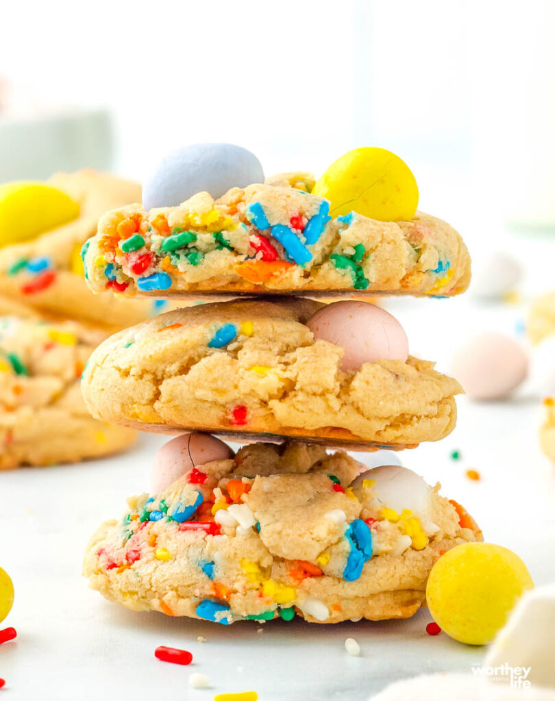 easter egg cookies stacked on top of each other