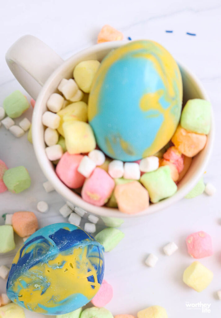 easter egg hot cocoa bomb in a white cup