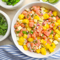 salmon ceviche in a white serving bowl