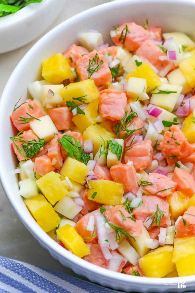 salmon in a large white serving bowl