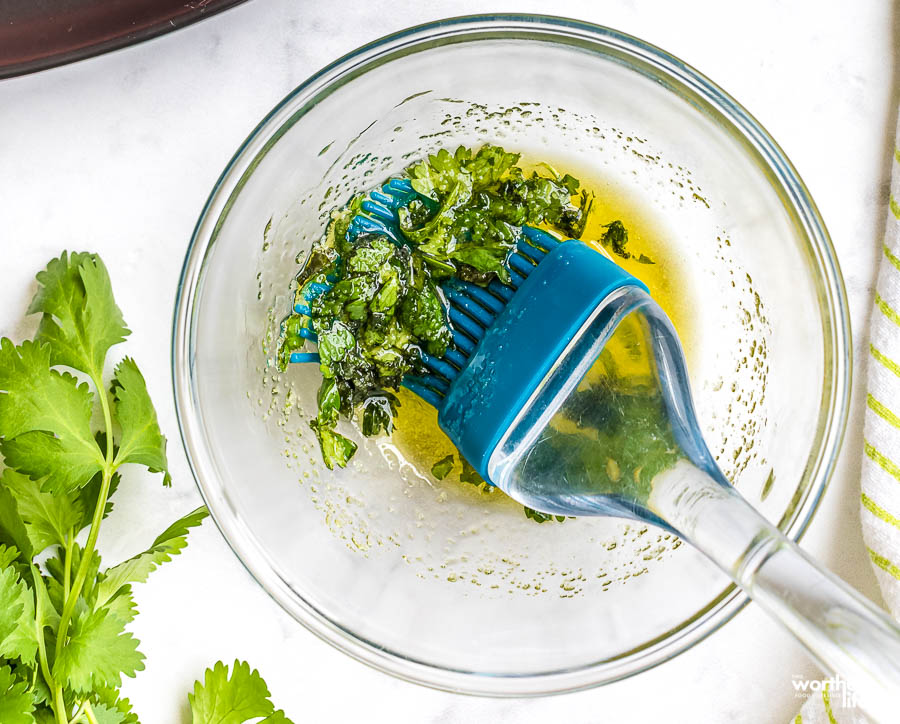 cilantro seasoning in a clear bowl