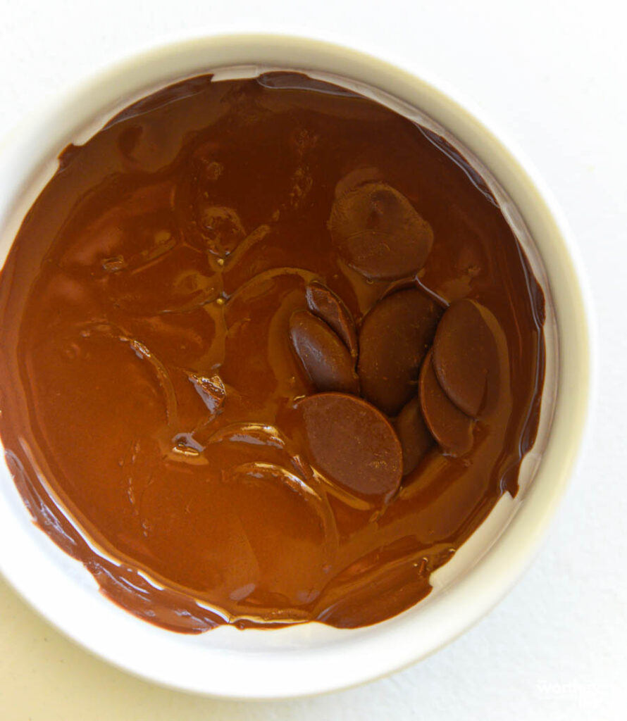 chocolate candy melt in a white bowl