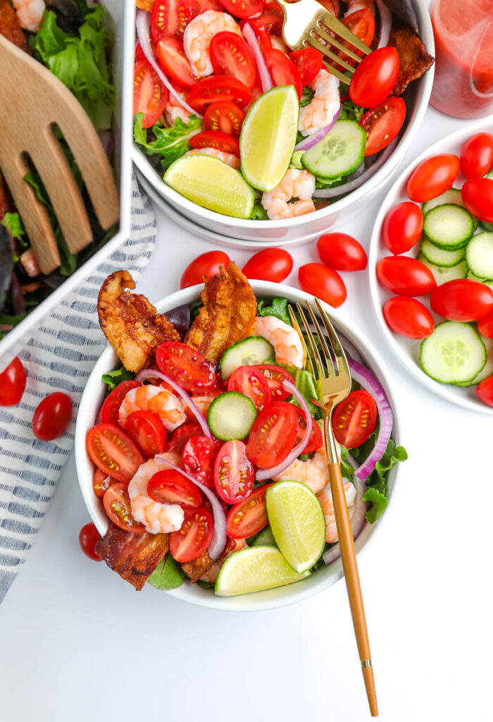 summer salads in white bowls