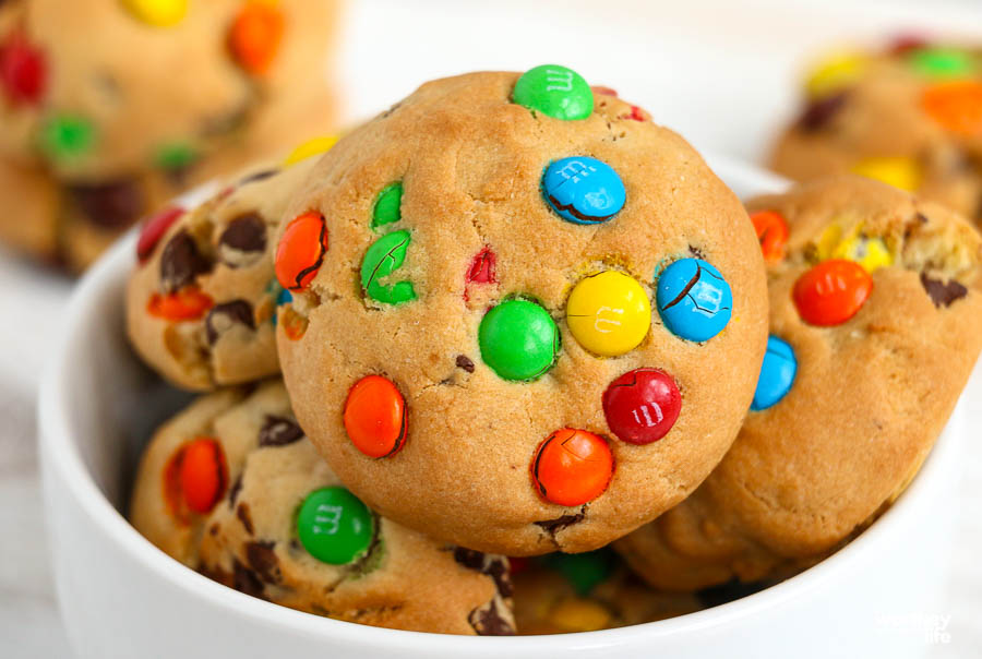 monster cookies in a white bowl