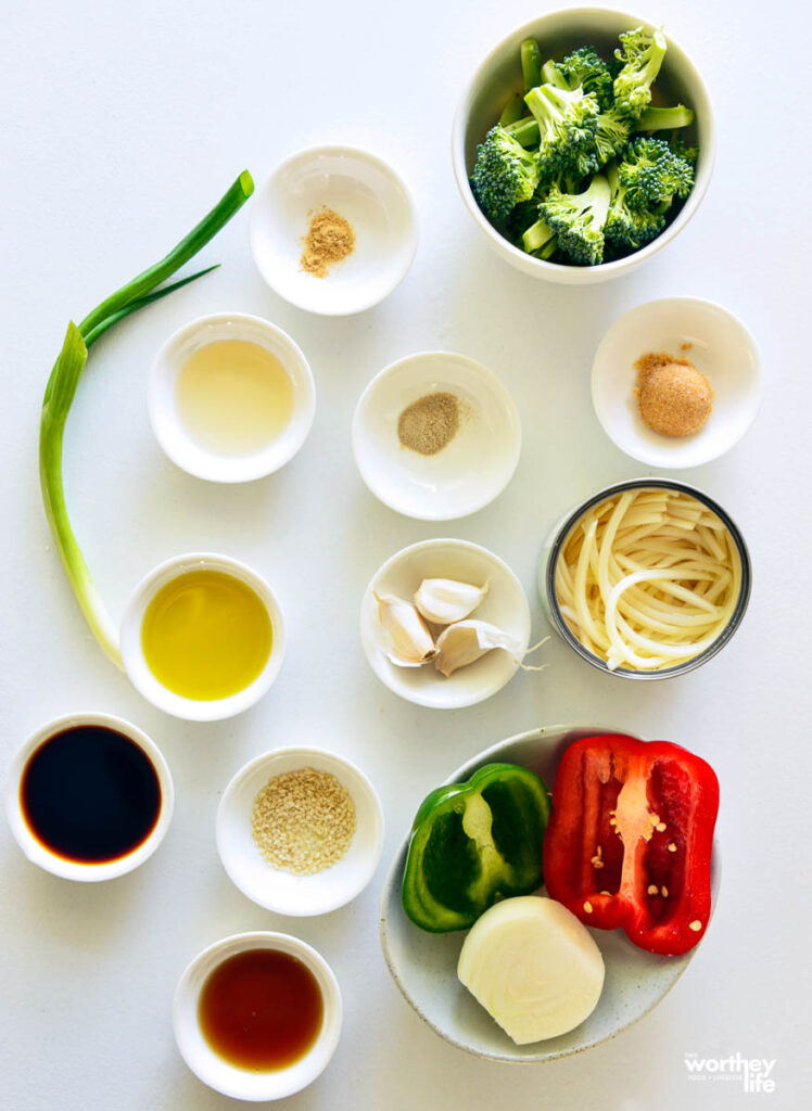 ingredients for lo mein in white bowls