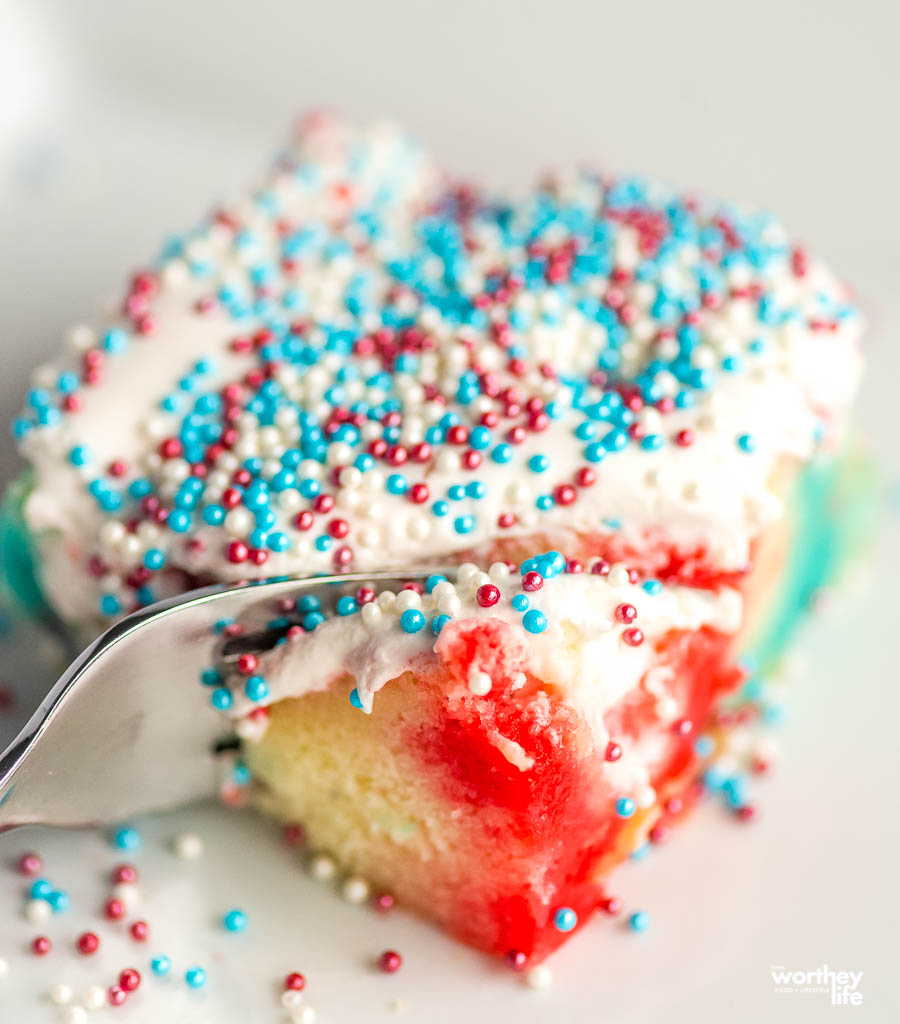 red white and blue cake with fork in it