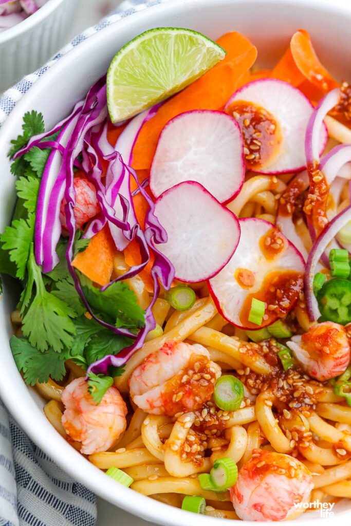 soba noodles in a bowl with fresh vegetables