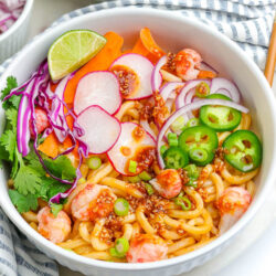 seafood sobo noodle salad in a white bowl