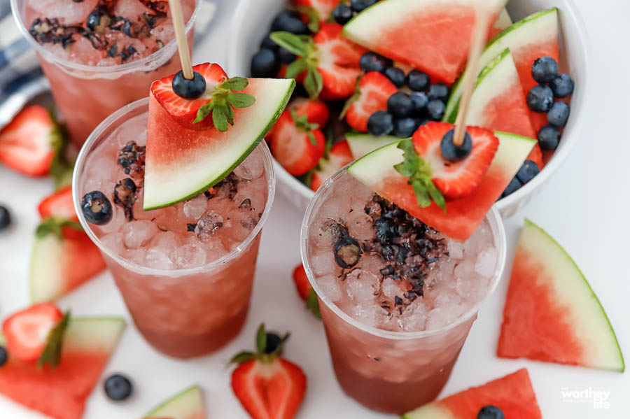 two party glasses of a virgin watermelon berry non-alcoholic drink