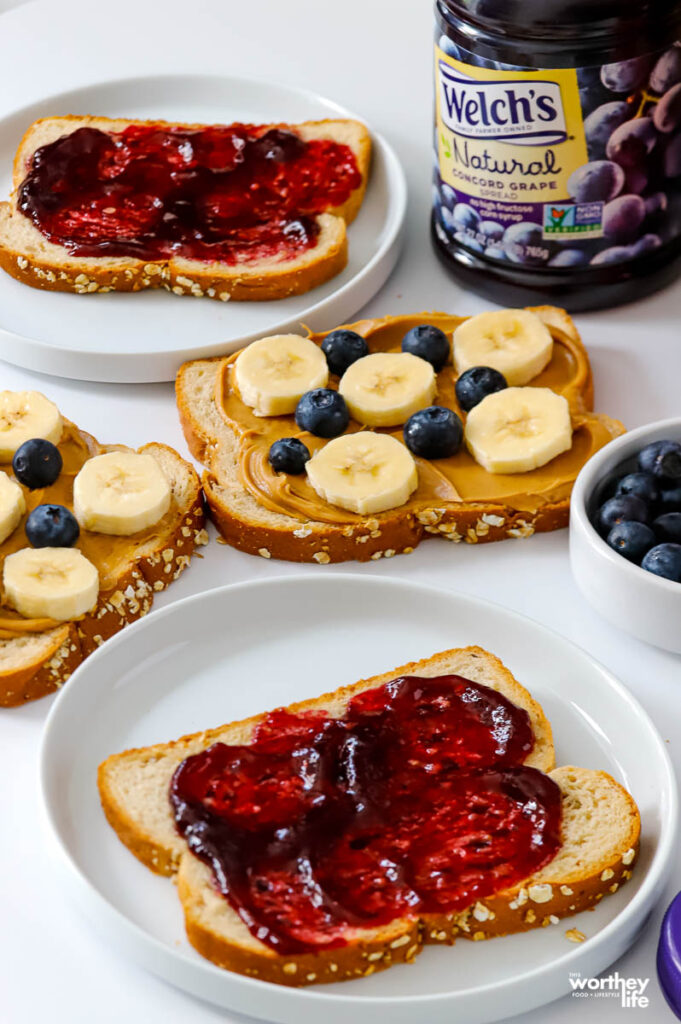 a slice of bread with concord grape spread on top