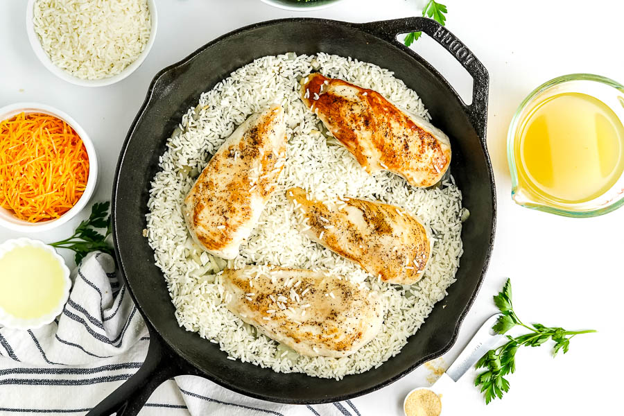 chicken over rice in cast iron skillet