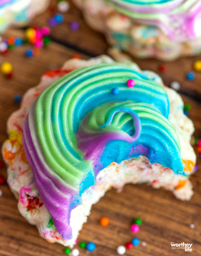 sprinkled sugar cookie with a bite in it