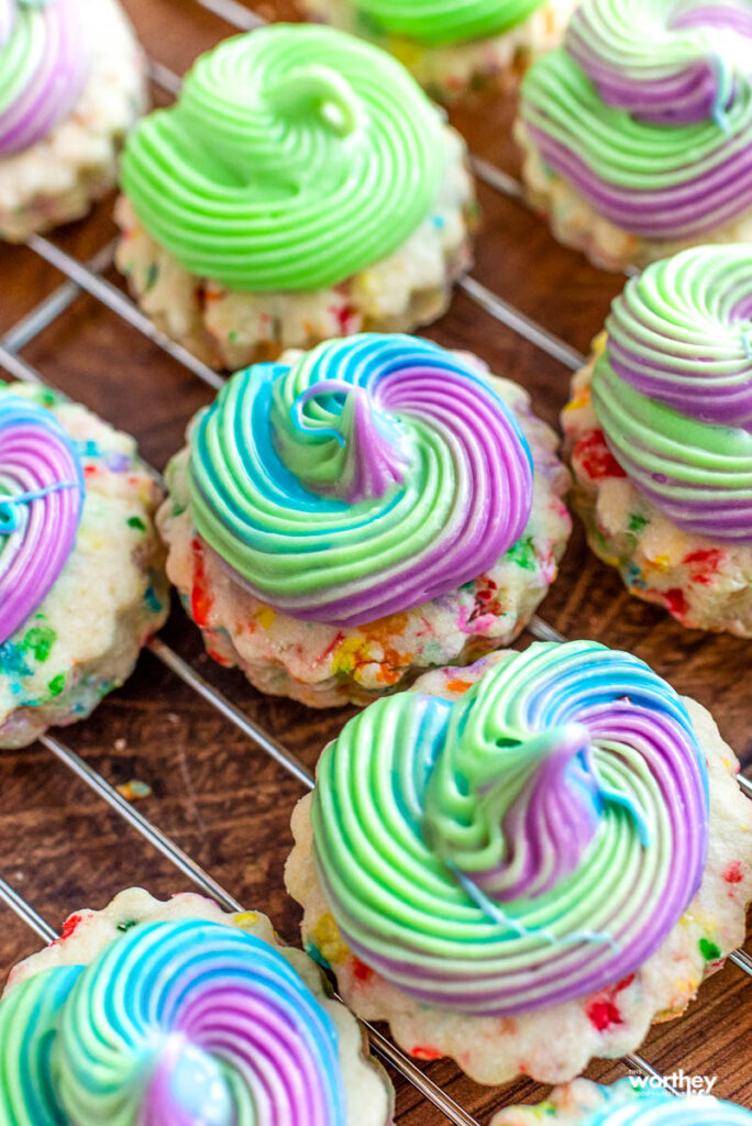 tie-dye sprinkled sugar cookies on a baking rack