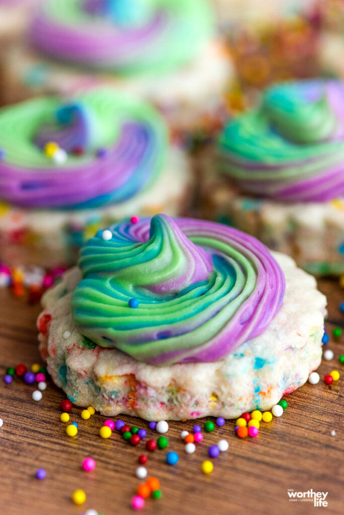 sprinkled sugar cookies with sprinkles on the side