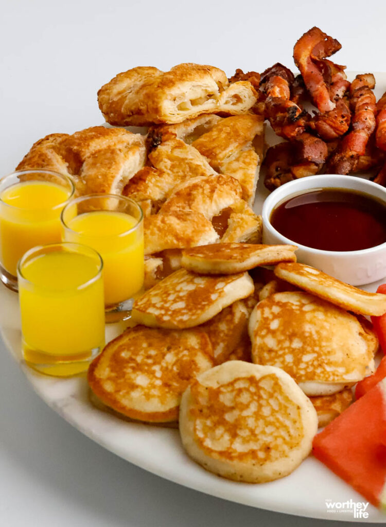 brunch foods on a large white platter