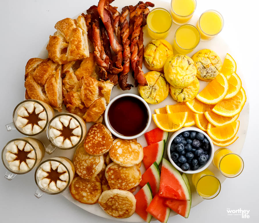 a platter filled with breakfast food options