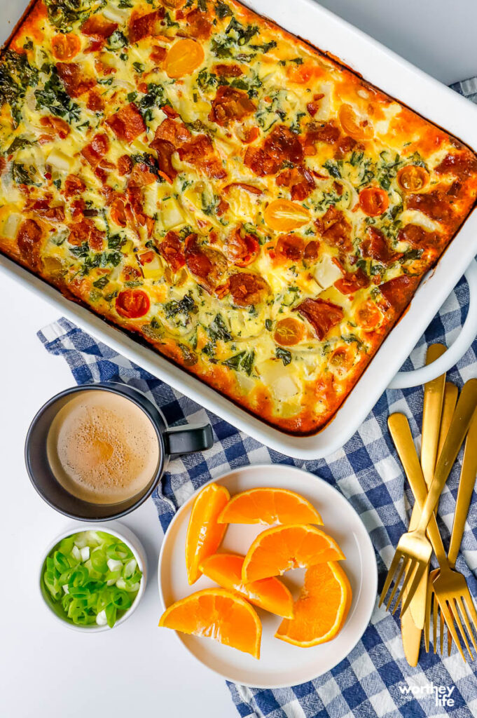 baked quiche in a white stone pan