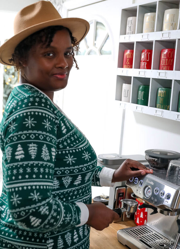 woman making coffee with breville barista express