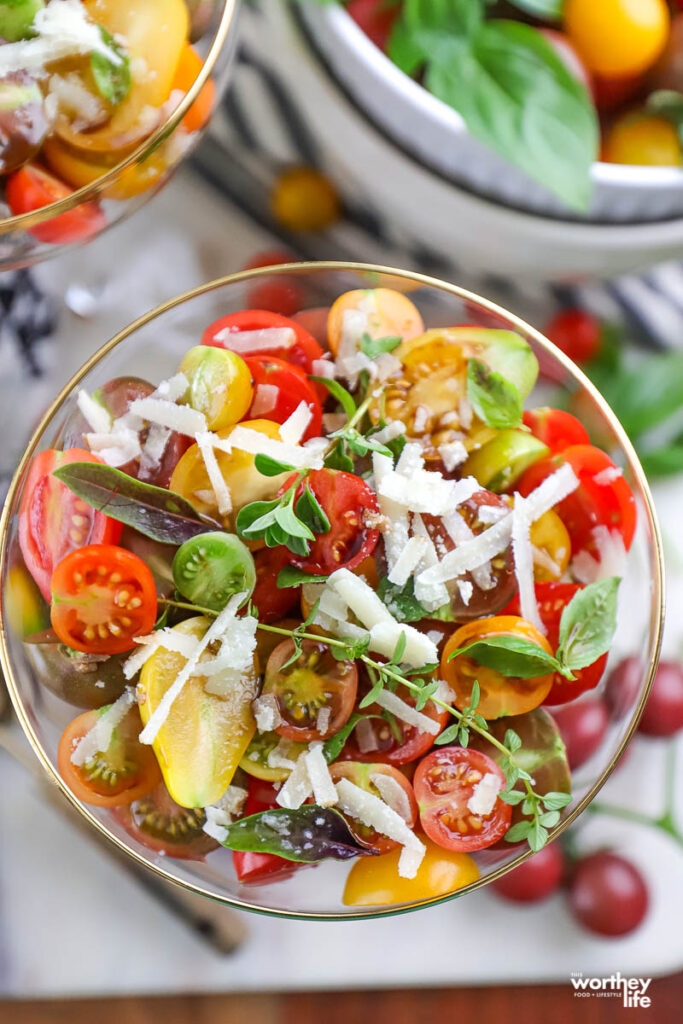 upclose fresh tomato salad with cheese sprinkled on top