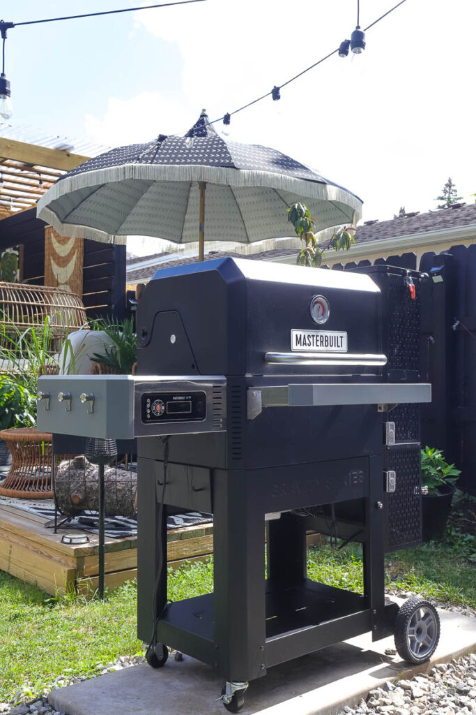 a black grill that is also a griddle and a smoker