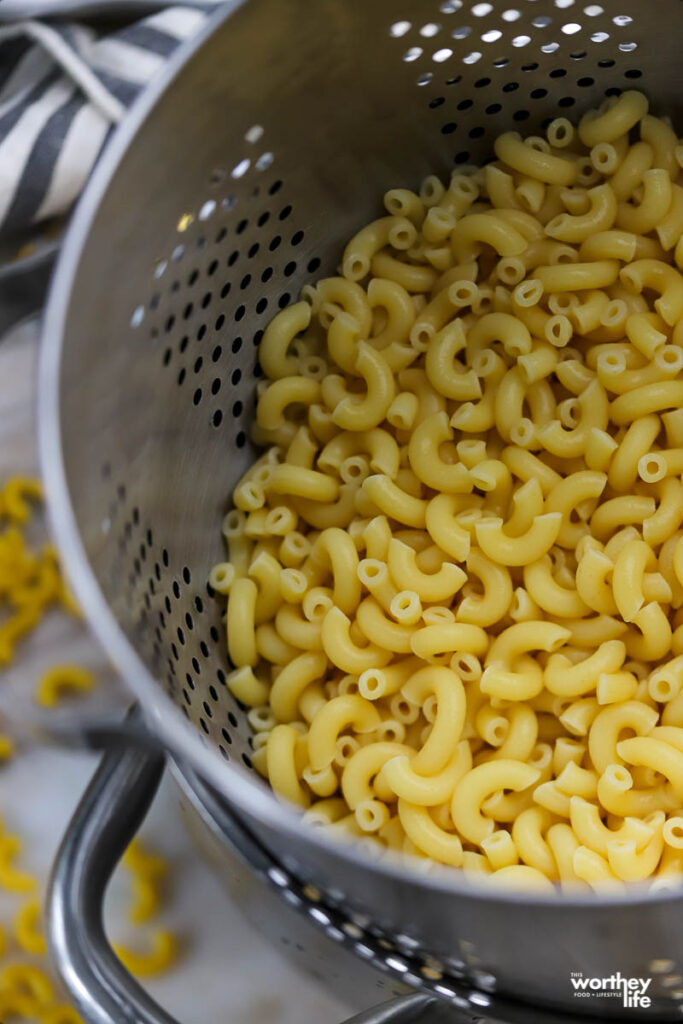 al dente noodles in a colander