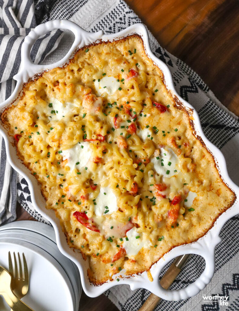 White Cheddar Mac and Cheese with Lobster in a white dish