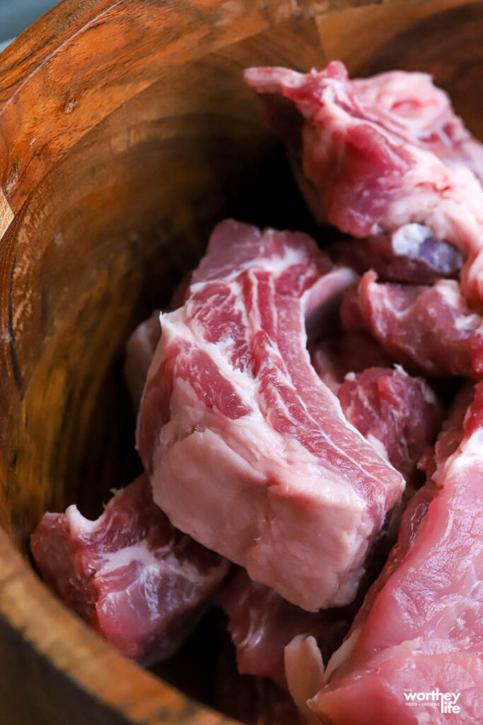 cuts of baby back rib in wood bowl