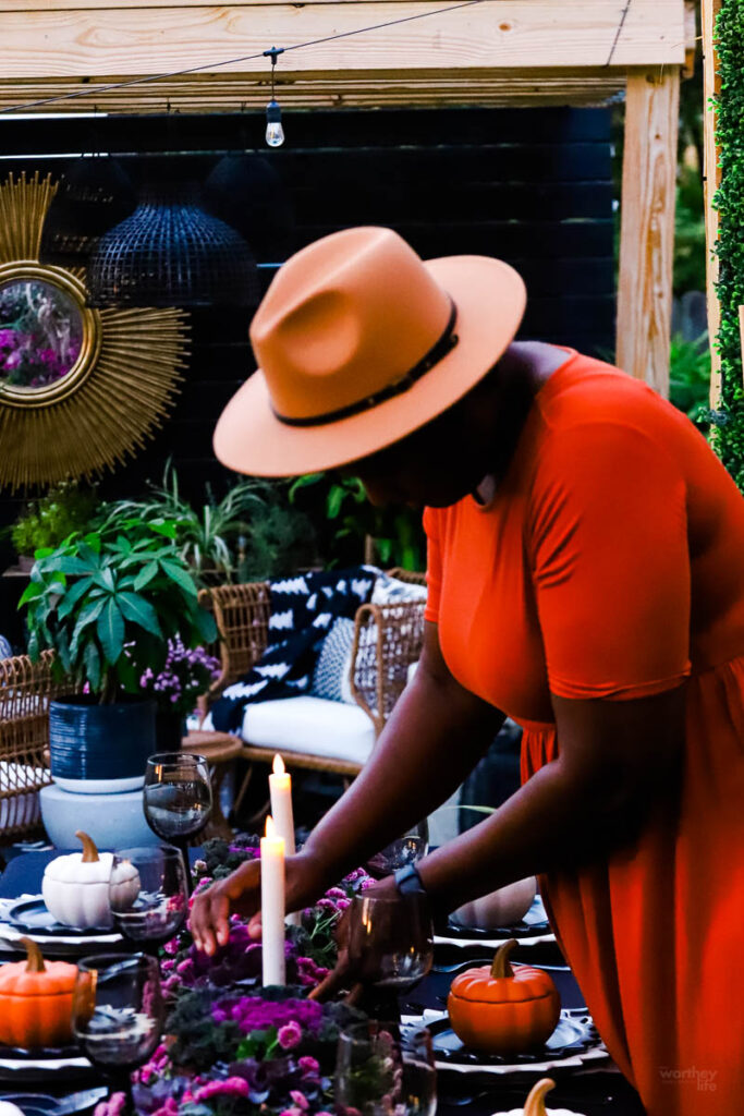 african american woman working on a tablescape