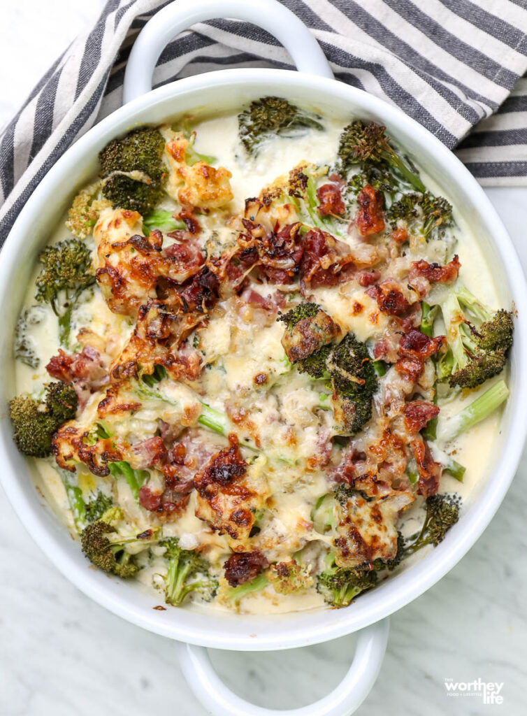 Broccoli with Prosciutto & Cream Gruyère sauce in white baking pan