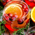 glass filled with juice and fresh fruit