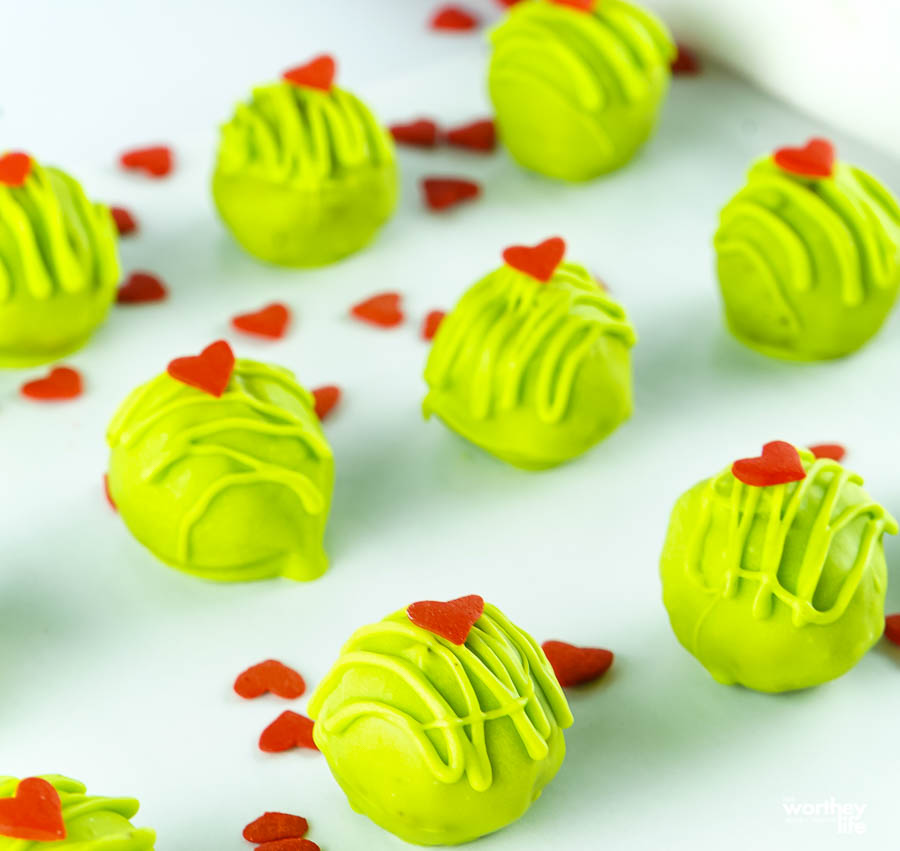 Grinch oreo dessert on baking sheet with parchment paper