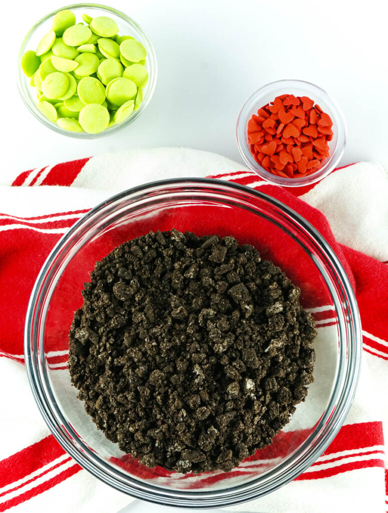 crushed oreos in clear bowl with candy melts