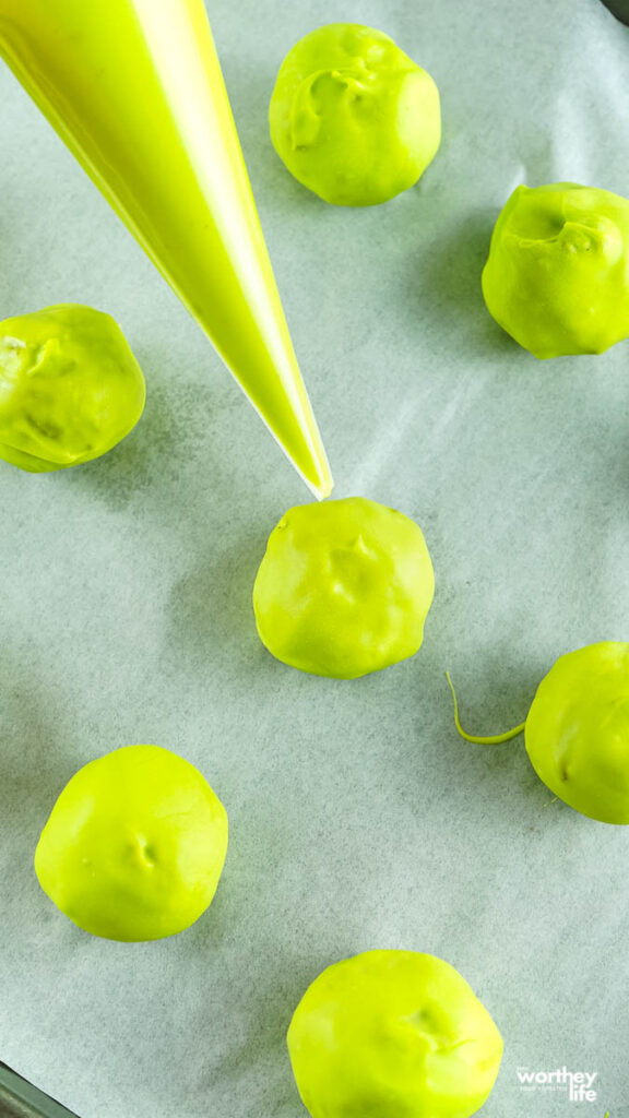 green candy melt on oreo balls