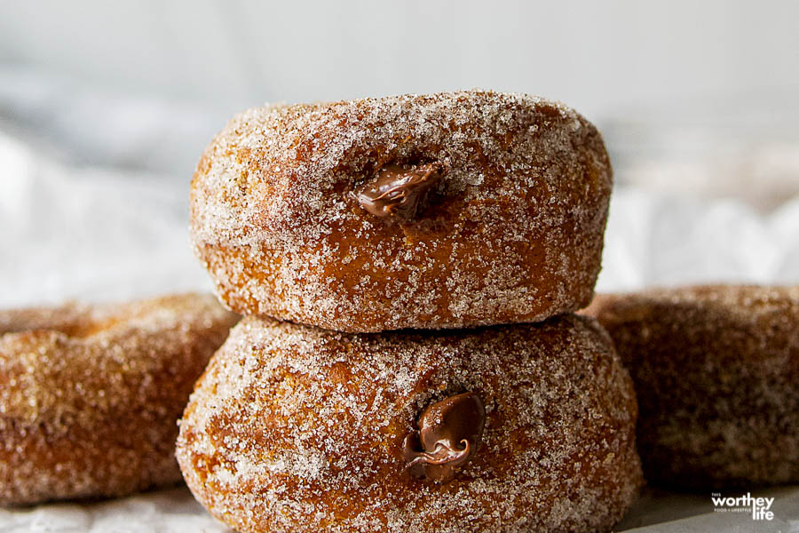 two stuffed donuts sitting on top of each other