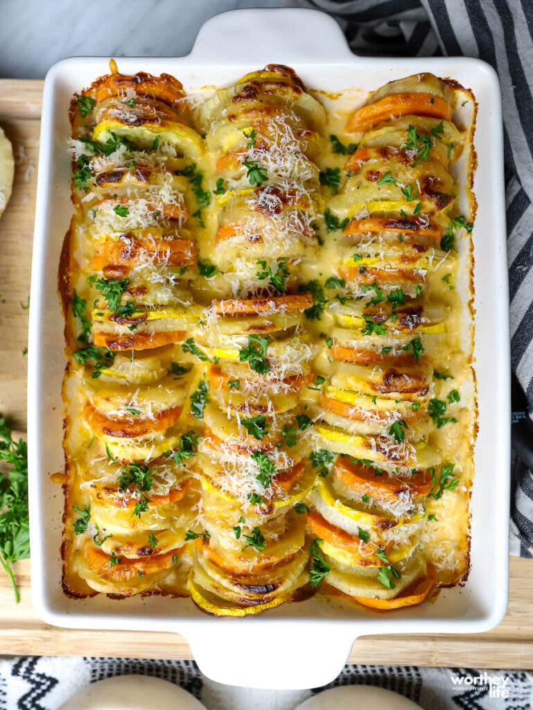 stacks of cheesy au gratin potatoes in baking dish