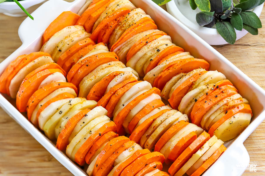 fresh potatoes in baking dish waiting to be baked