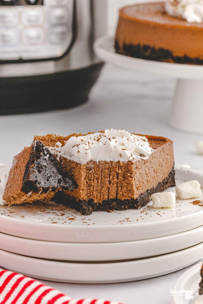 bite of hot chocolate cheesecake on white plate