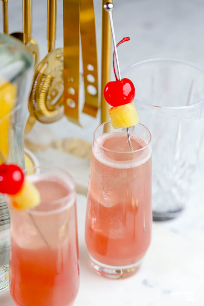 pink bubbly drink in glasses