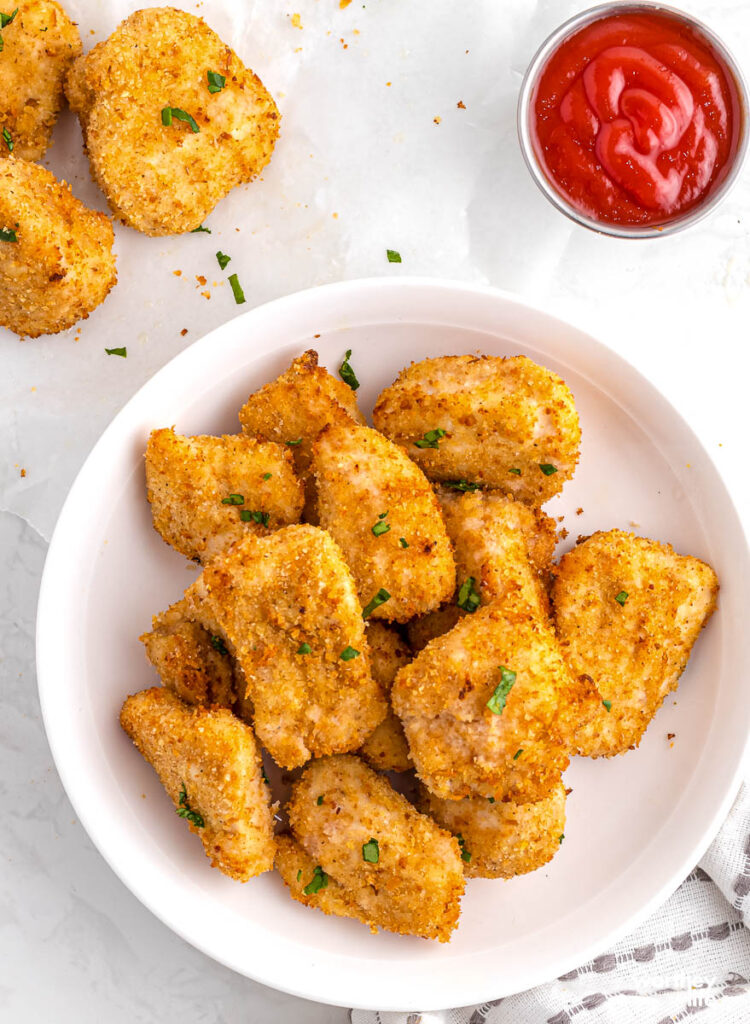 air fryer chicken nuggets on white plate