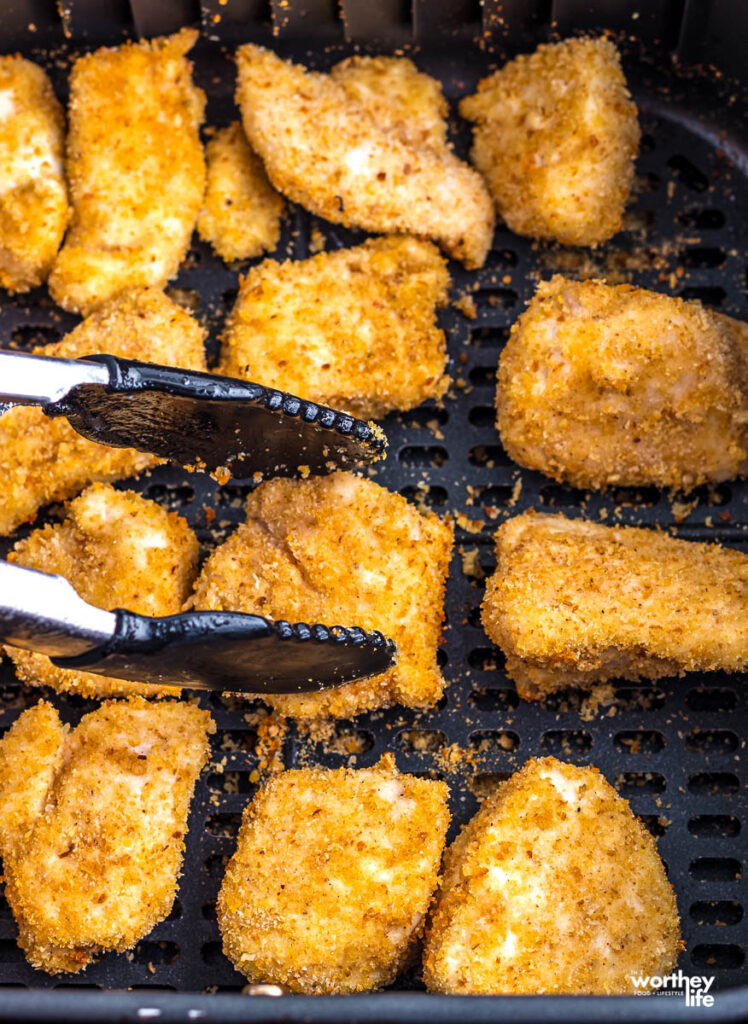 cut up chicken breasts with breading