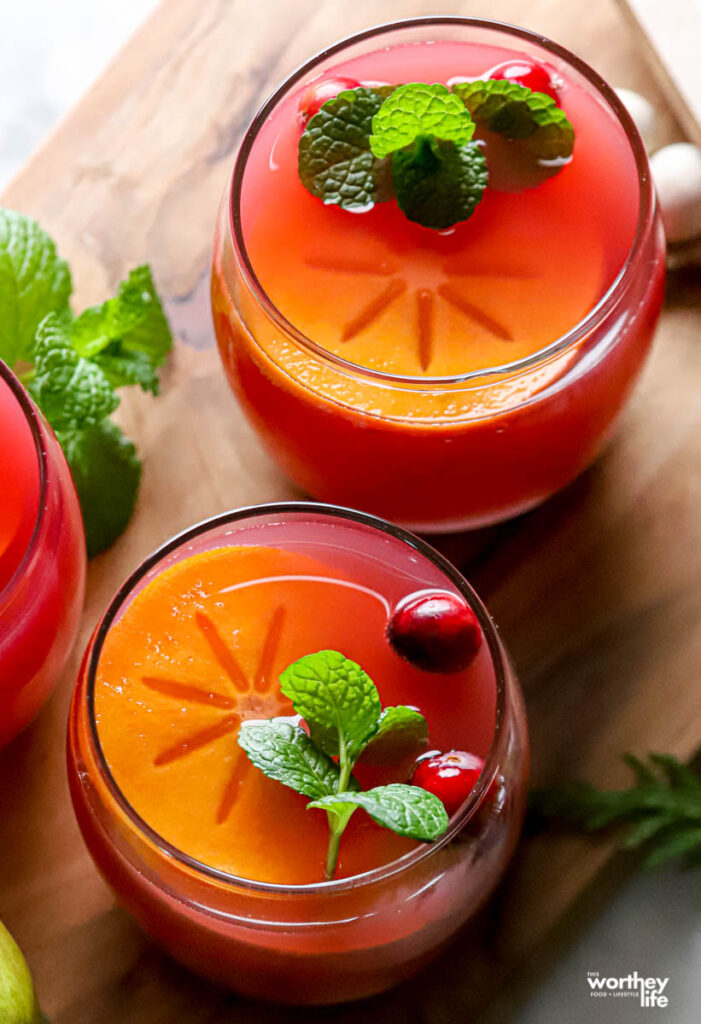 two glasses of Christmas inspired punch