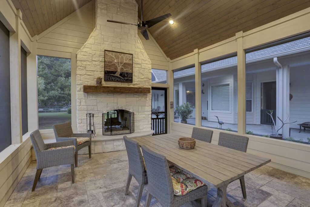 outdoor dining area with fireplace