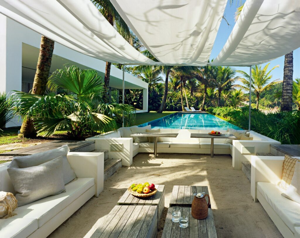 outdoor living with seating and pool idea