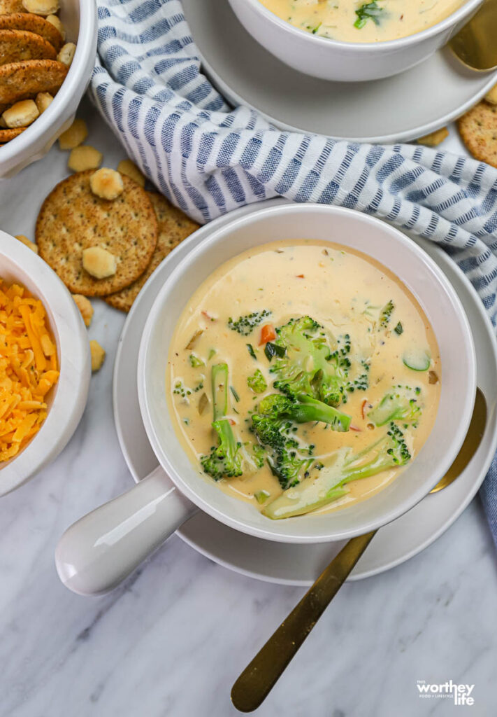 white soup bowl of broccoli cheddar soup