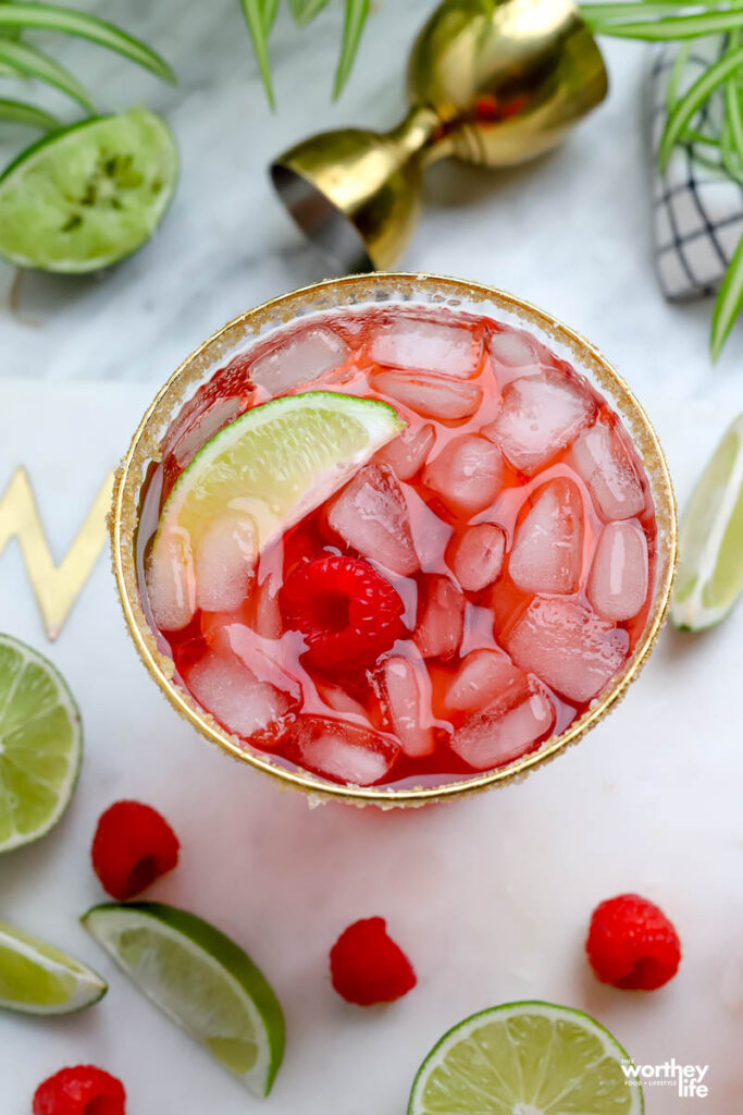 Raspberry cocktail on white background