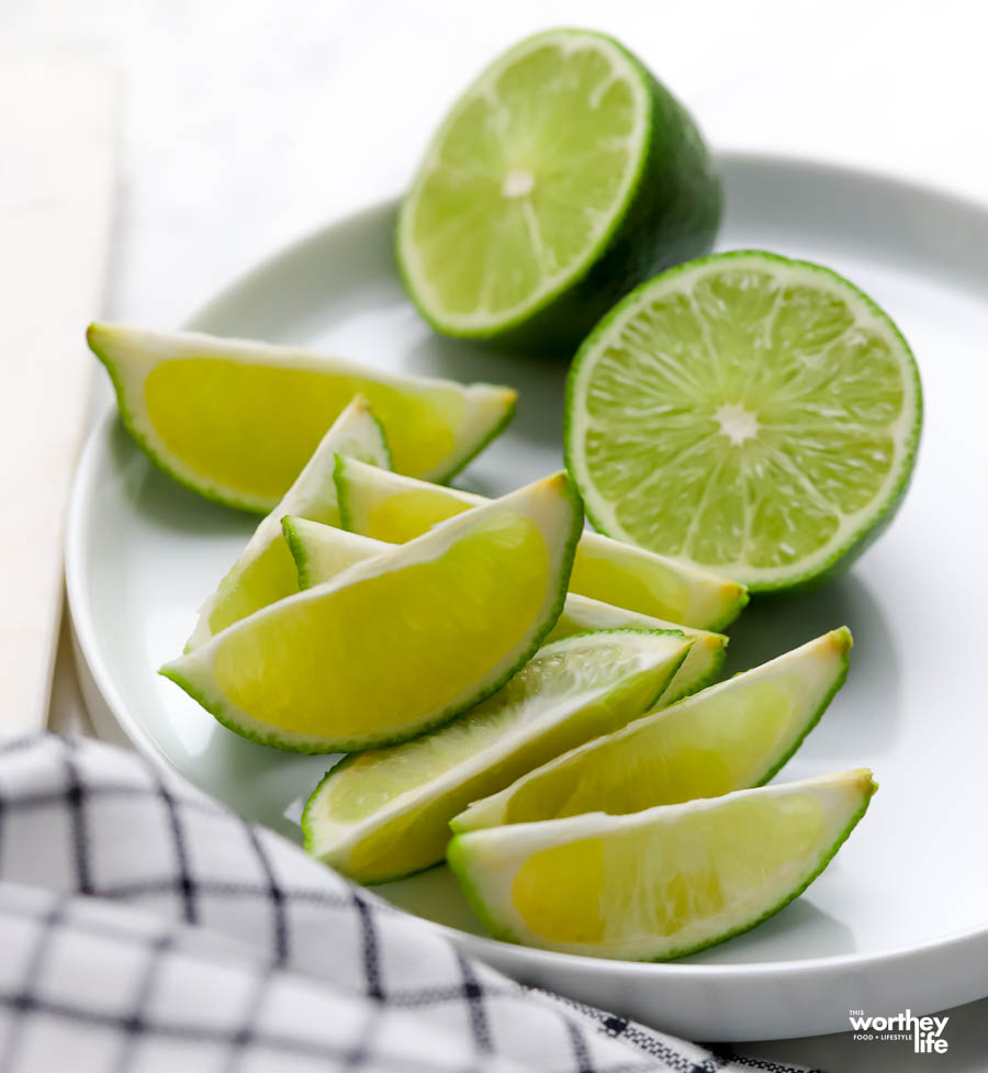 Sliced Limes on white plate