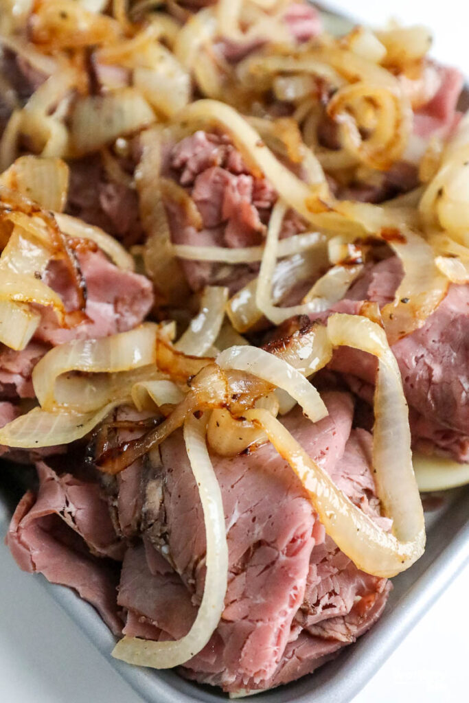 caramelized onions atop of roast beef sliders