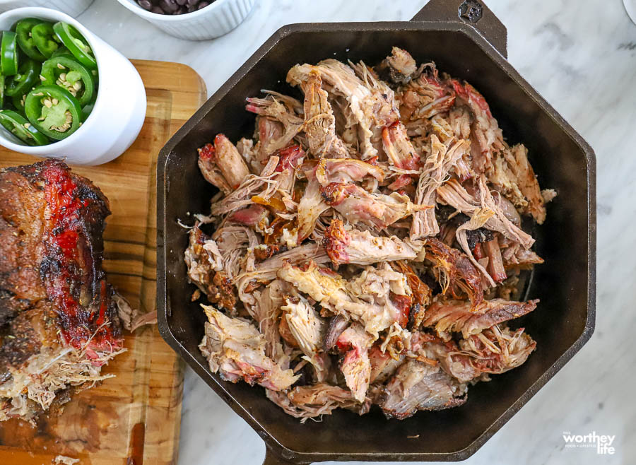 shredded smoked pork in cast iron skillet