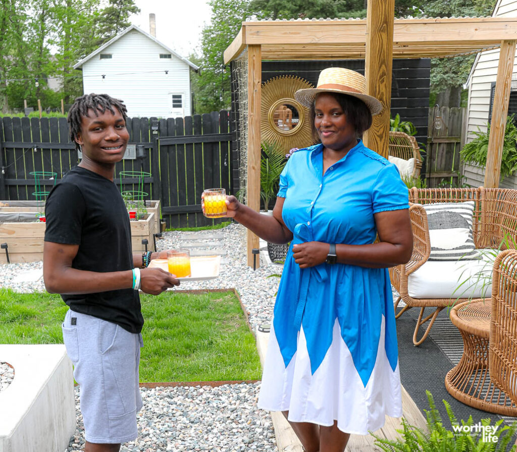 mom and son drinking florida orange juice